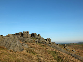Fototapeta premium panoramic view of a large rugged gritstone outcrop at the bridestones a large rock formation in west yorkshire near todmorden