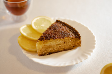 homemade lemon pie on white background flavored tea