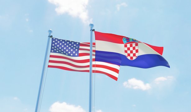 Croatia and USA, two flags waving against blue sky. 3d image