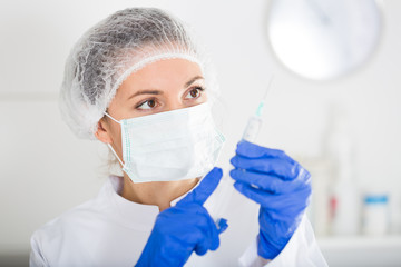 Nurse making injection