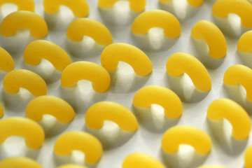 Raw wheat pasta close up