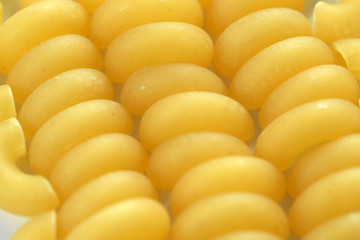 Raw wheat pasta close up