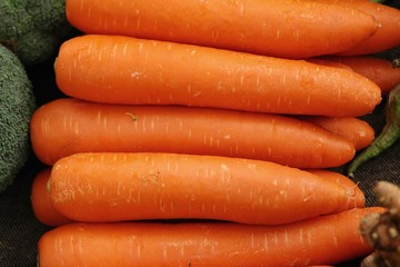 Fresh organic carrots for cooking in market