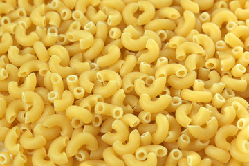 Raw wheat pasta close up