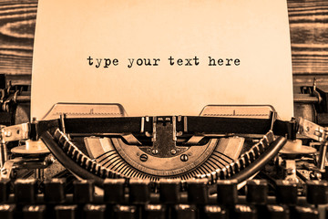 type your text here printed on a sheet of paper on a vintage typewriter. writer, journalist