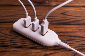 charger on wooden table background. electronic device