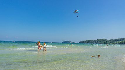 Romantic photo session of couple on the beautiful beach in on Phu Quoc island Sao beach, April 1, 2019