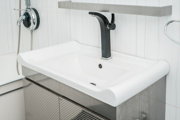 The photo of a sink in a bathroom