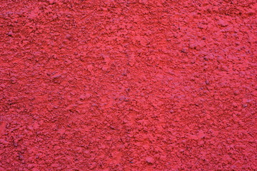 Cement painted wall background, pink vivid color