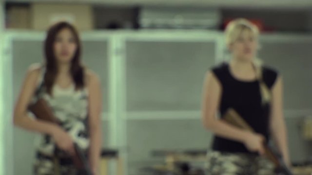 Slow Motion - Asia Girl Aiming Thomson