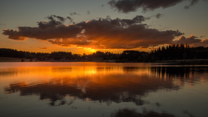 Fototapeta na wymiar Sunset on the Devesset lake near Saint Agrève - Ardèche, France