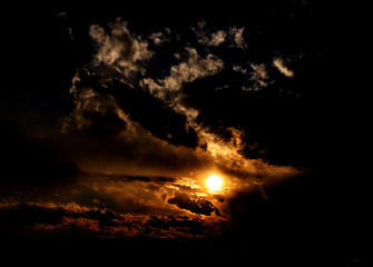 Naklejka premium colorful apocalyptic sunset with mighty clouds