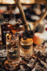 A close up shot of whisky cocktails with ice cubes. Concept of fine alcohol, beverage and cocktails.