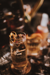 A close up shot of whisky cocktails with ice cubes. Concept of fine alcohol, beverage and cocktails.