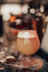 A close up shot of whisky cocktails with ice cubes. Concept of fine alcohol, beverage and cocktails.