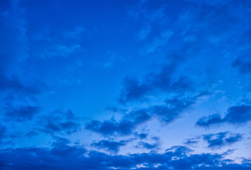 Fototapeta na wymiar dramatic cloudy sunset sky blue hour background