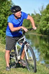 Athlete Retiree Male Cyclist Relaxing Wearing Helmet Riding Bike