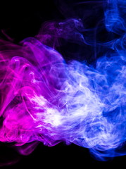 Colored smoke on black background