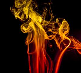 Colored smoke on black background
