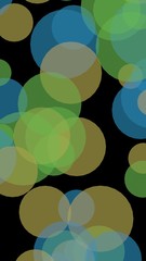 Multicolored translucent circles on a dark background. 3D illustration