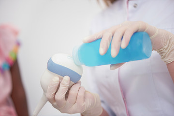 Ultrasound probe and coupling gel prepare for diagnostic.