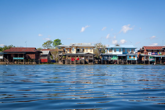 View to traditional floating village with houses built on piles at Inle lake, shan state, Myanmar.