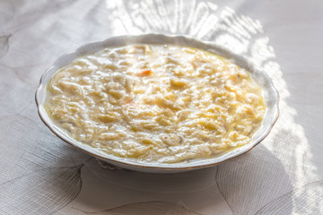 Polish traditional beef broth with noodles knows in Poland as lane kluski.