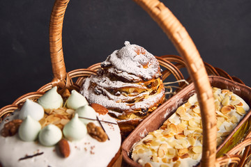 Congratulatory Easter cake in the basket, Traditional Kulich, Paska  ready for celebration