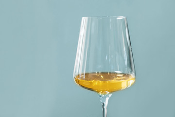 Glass of white wine on a table
