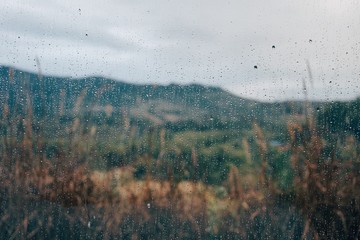 rainy on the window, rain on the glass window, rainy season