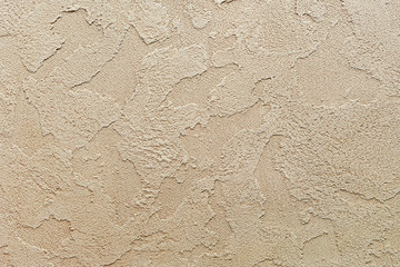 Fototapeta premium Background and texture of decorative plaster to cover the walls and ceilings. Background for design and decoration.