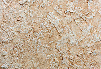 Background and texture of decorative plaster to cover the walls and ceilings. Background for design and decoration.