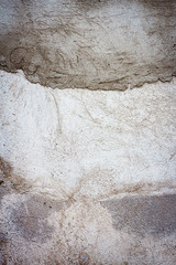 Gray uneven concrete wall texture background