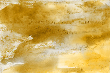 Yellow spring watercolor texture with abstract washes and brush strokes on the white paper background. Chaotic abstract organic design.