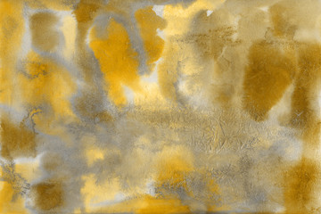 Yellow spring watercolor texture with abstract washes and brush strokes on the white paper background. Chaotic abstract organic design.