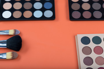 Professional makeup products with cosmetic beauty products, foundation, lipstick, brushes and tools.