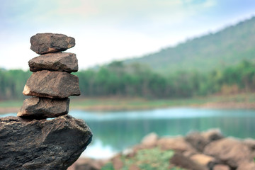 Balance stone with spa beside the river