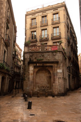 Fototapeta na wymiar Street in the Gothic quarter of Barcelona, Catalonia, Spain
