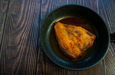 Fried flounder. Home cooking in a rustic style.