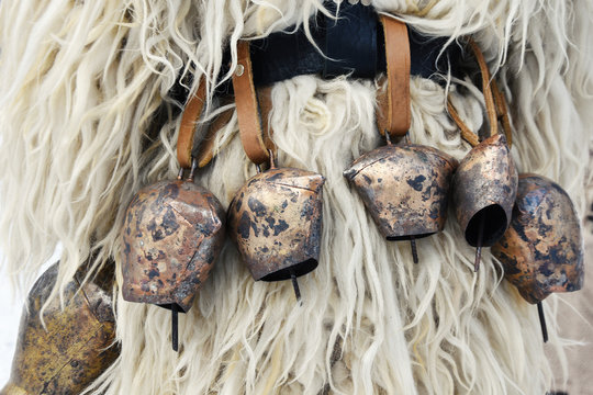 Copper bells on shipskin - close-up detail of kuker costume; old Bulgarian tradition 