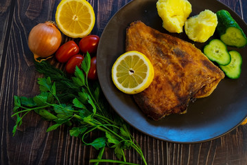 Fried flounder. Home cooking in a rustic style.