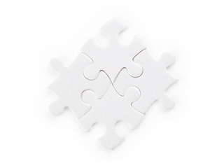 Four white puzzle pieces isolated with clipping path