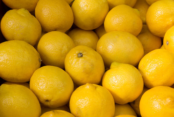 lemons on the counter in the store