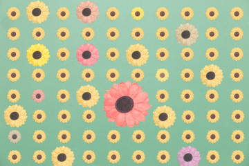 yellow paper flower and colorful on light green paper background, summer theme