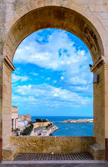 Arch in Upper Barrakka Gardens, Valletta, Malta. View over Grand Harbor and city