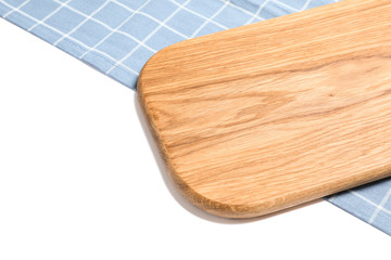 Cutting board with kitchen towel isolated on white background