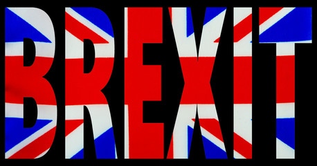 Bold text cutout letters from the image of a national flag with black background. Great photo with graphic elements for United Kingdom and European Union conflict.
