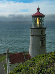 Fototapeta na wymiar Historic Heceta Head Lighthouse on a promontory above the Pacific Ocean near Yachats, Oregon. Built in 1894.