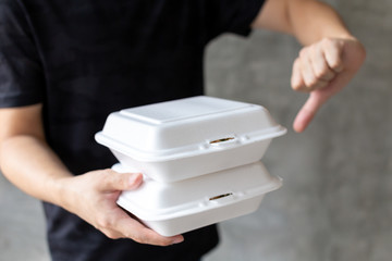 Crop male saying no to foam containers because they being toxic, environmentally dangerous and...