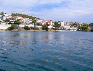 Fototapeta na wymiar Panorama of the coastal residential village. European city
